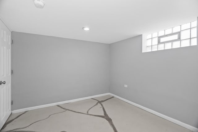 spare room featuring concrete floors