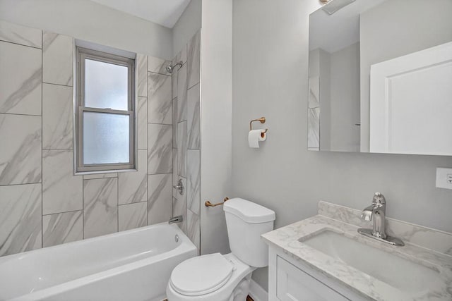 bathroom with toilet, shower / tub combination, and vanity