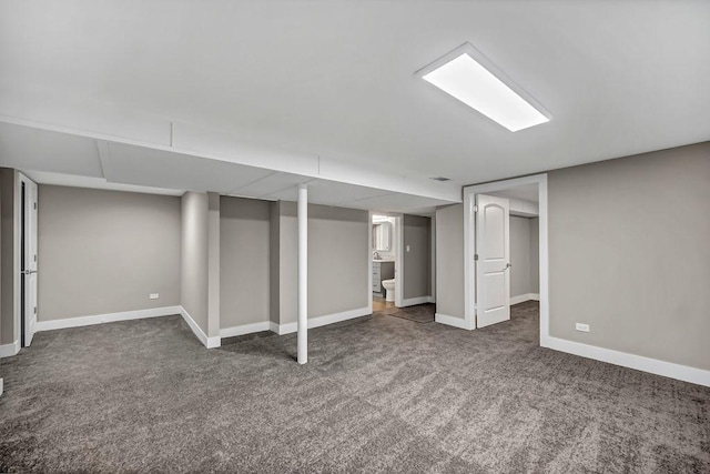 finished basement with carpet and baseboards