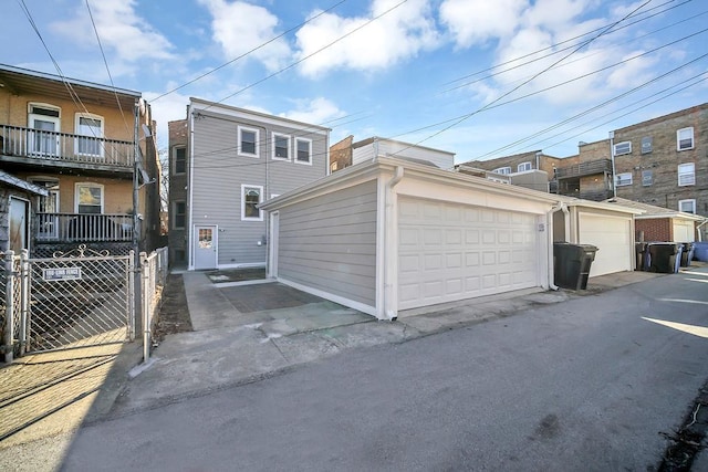 garage with fence