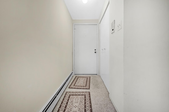 doorway with baseboard heating