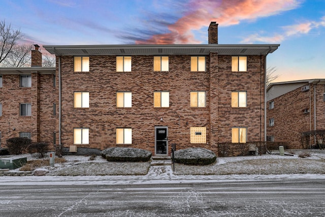 view of snow covered property