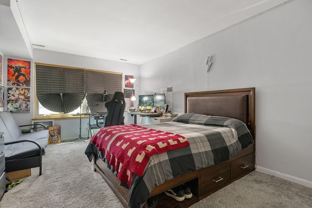 bedroom with light colored carpet