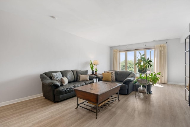 living room featuring light wood-type flooring