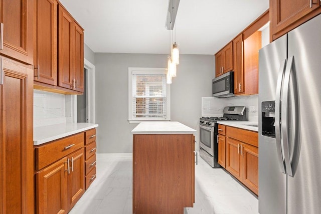 kitchen featuring decorative backsplash, decorative light fixtures, stainless steel appliances, and a kitchen island