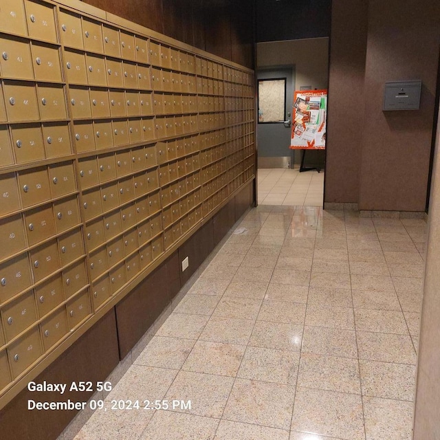 hallway featuring mail boxes