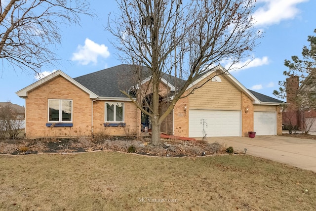 single story home featuring a garage and a front lawn