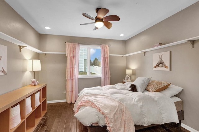 bedroom featuring dark hardwood / wood-style flooring and ceiling fan