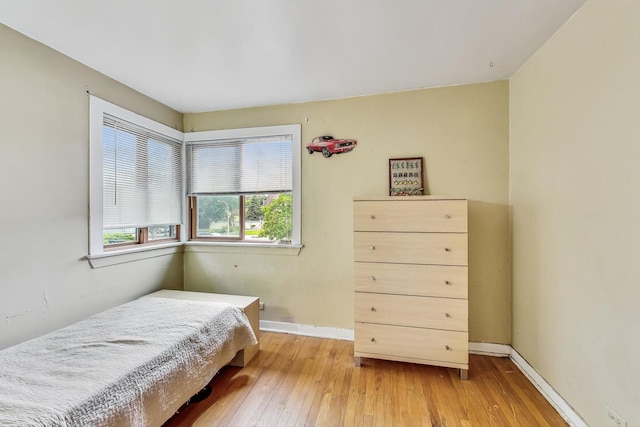 bedroom featuring light wood-type flooring