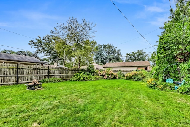 view of yard featuring a fire pit