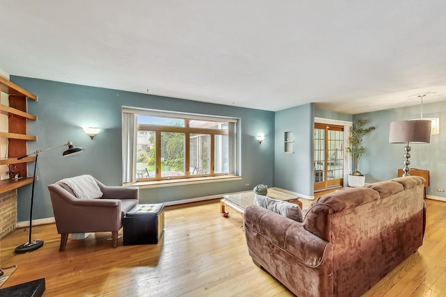 living room with light hardwood / wood-style floors