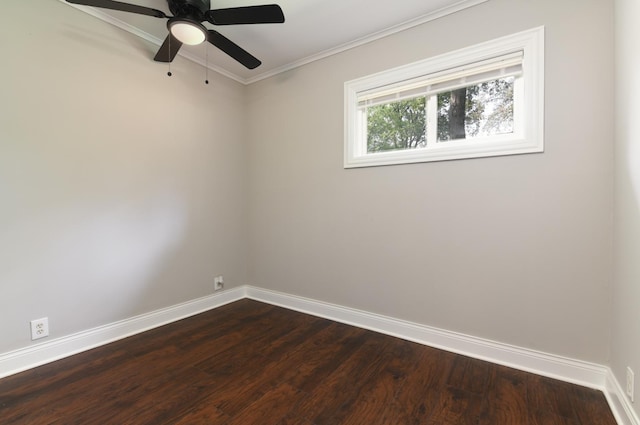 empty room featuring ceiling fan, hardwood / wood-style floors, and ornamental molding