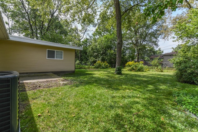 view of yard featuring central AC