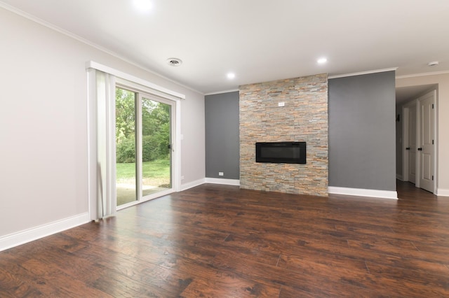 unfurnished living room featuring a fireplace, dark hardwood / wood-style floors, and ornamental molding