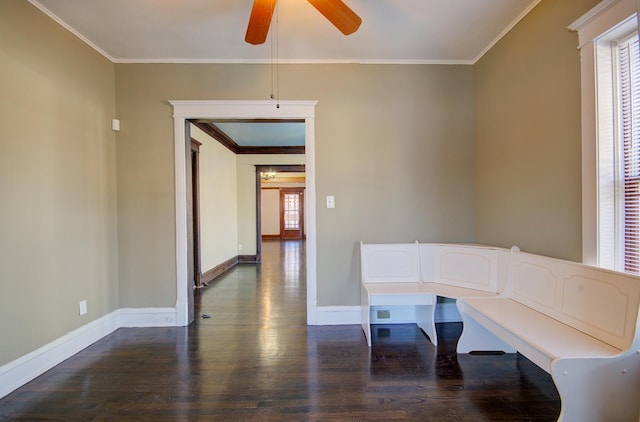 miscellaneous room featuring ceiling fan, dark hardwood / wood-style floors, and ornamental molding