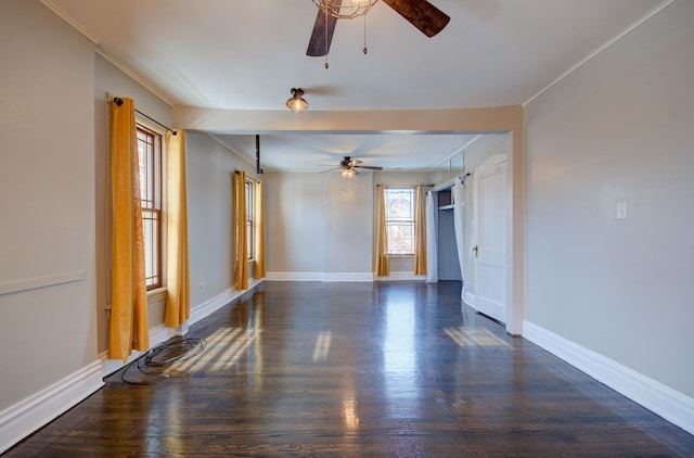 unfurnished room featuring dark hardwood / wood-style flooring and ceiling fan