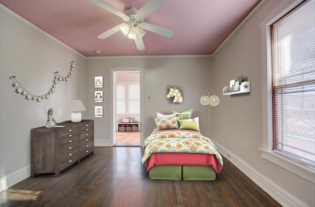 bedroom featuring ceiling fan, dark hardwood / wood-style floors, and ornamental molding