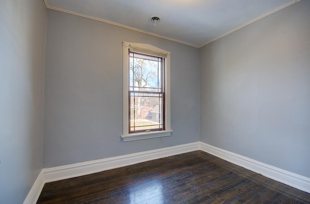 unfurnished room with crown molding and dark hardwood / wood-style floors