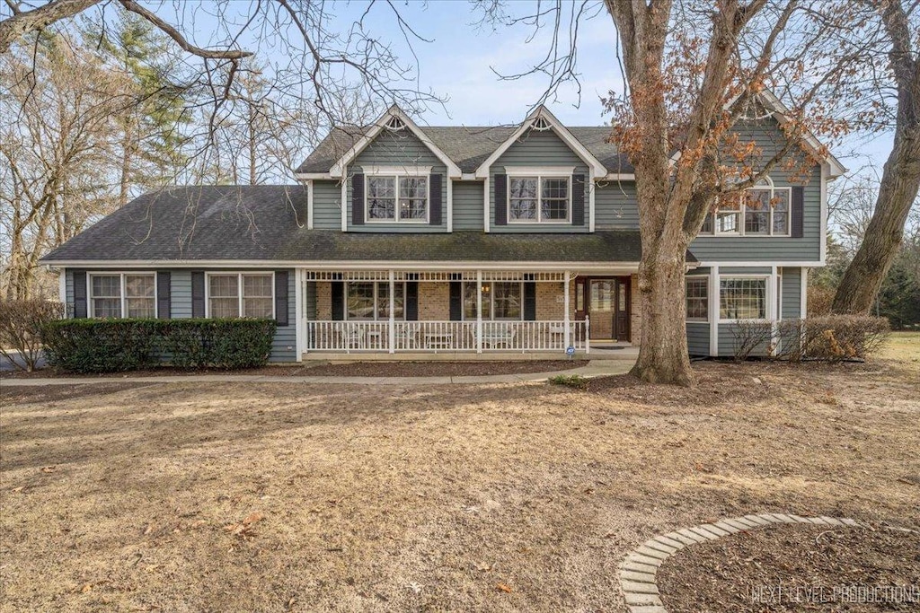 craftsman-style home with covered porch