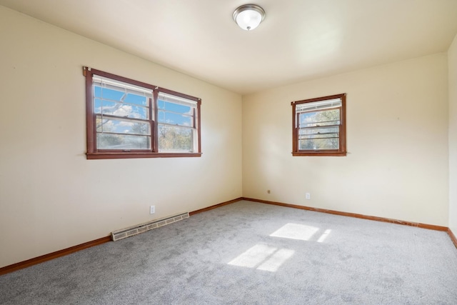 spare room with carpet floors