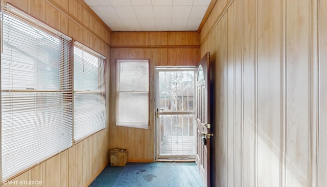 unfurnished sunroom featuring plenty of natural light