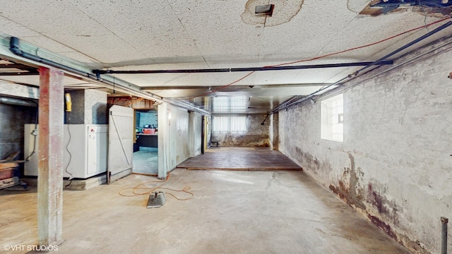 basement featuring heating unit