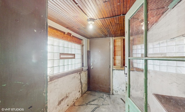 interior space featuring wood ceiling