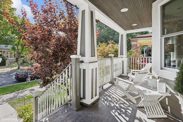 wooden terrace with covered porch