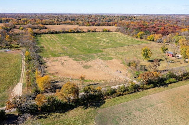 birds eye view of property featuring a rural view