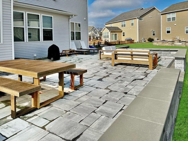 view of patio featuring a residential view and an outdoor hangout area