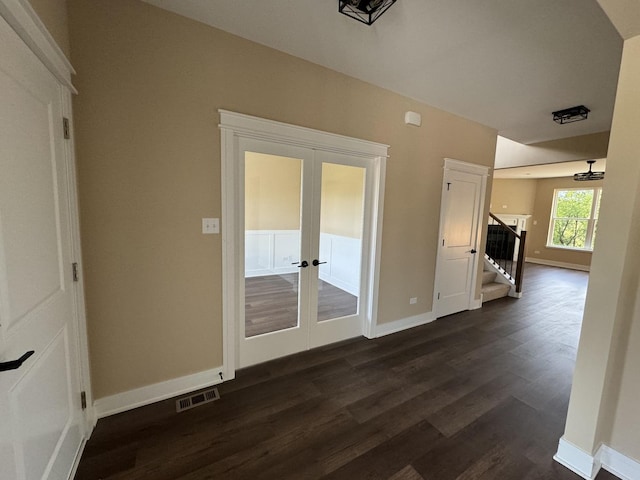 interior space featuring dark hardwood / wood-style floors and french doors