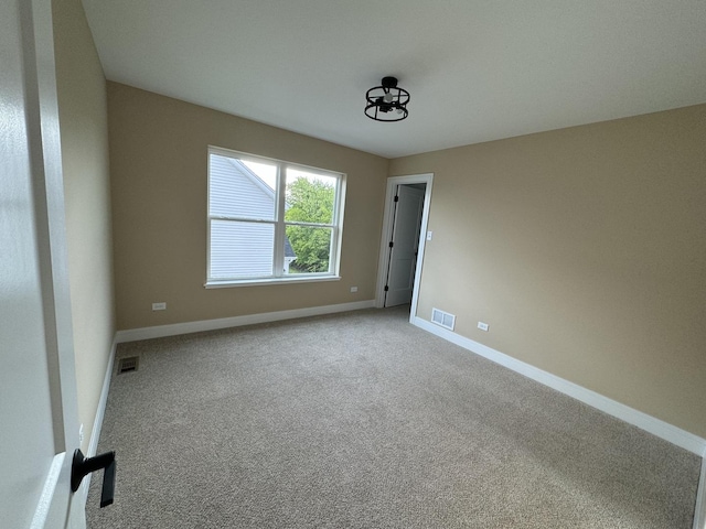 view of carpeted spare room