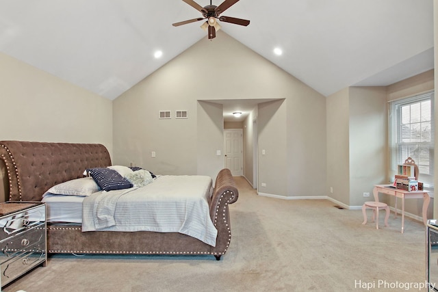 bedroom featuring ceiling fan, light carpet, and lofted ceiling