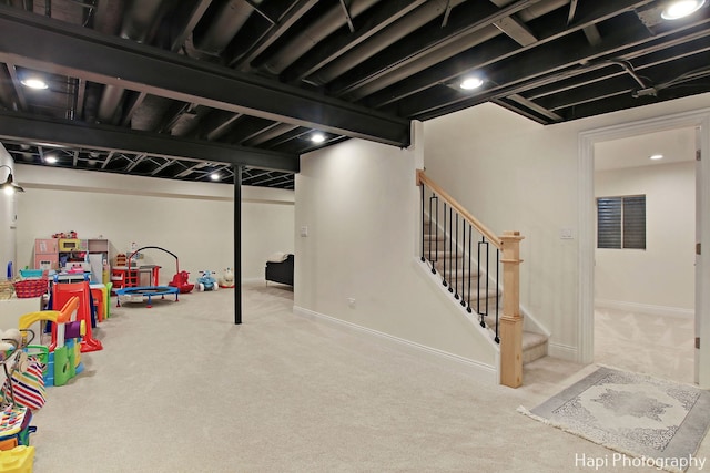 playroom with light colored carpet