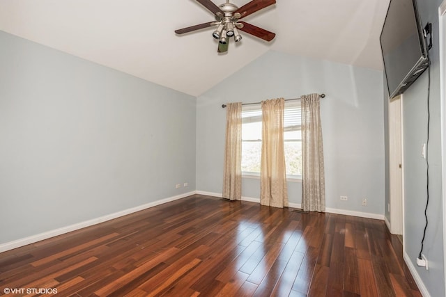 unfurnished room featuring ceiling fan, dark wood-type flooring, and vaulted ceiling