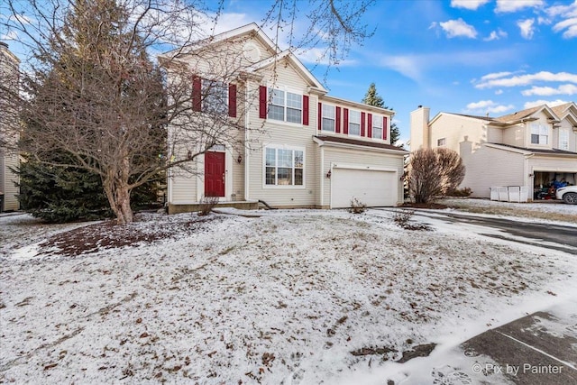 view of property featuring a garage