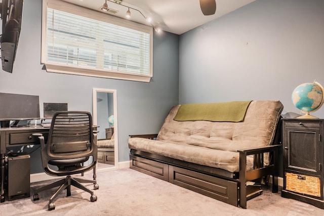 home office with ceiling fan, rail lighting, and light colored carpet