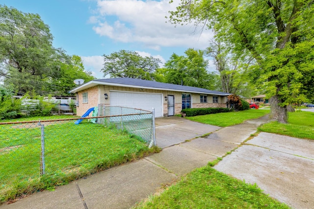 ranch-style home with a front yard and a garage