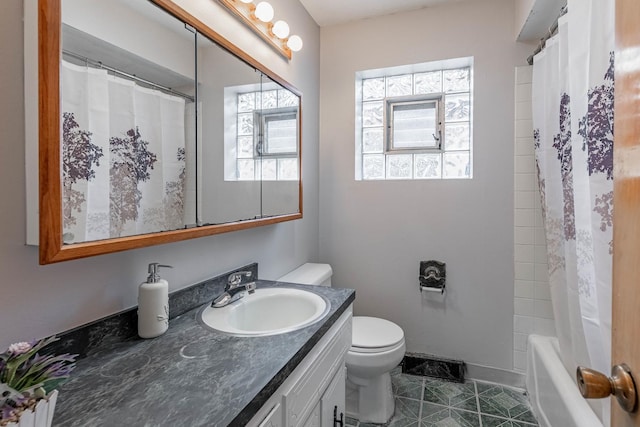 full bathroom with vanity, toilet, and shower / bathtub combination with curtain