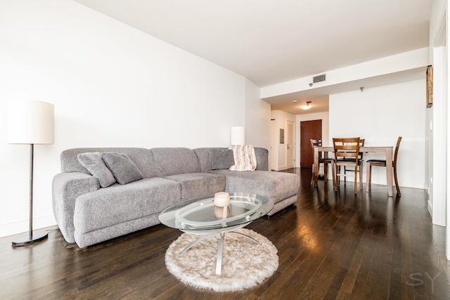 living room with dark wood-type flooring