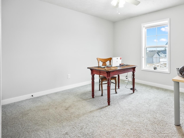 home office with carpet flooring and ceiling fan