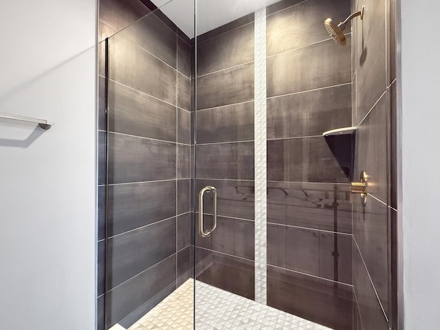 bathroom featuring an enclosed shower