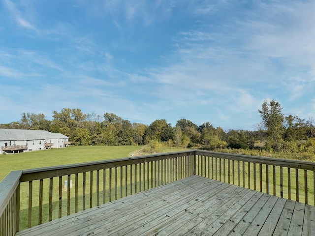 deck featuring a yard