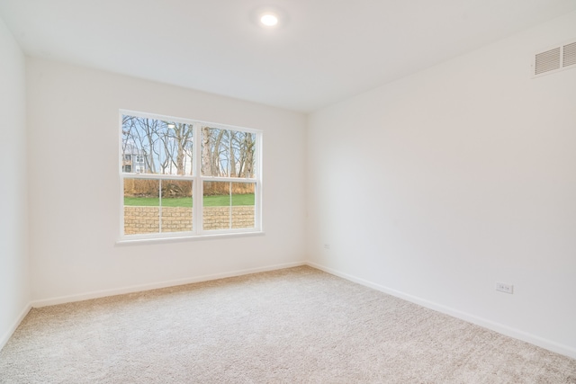 empty room featuring carpet floors