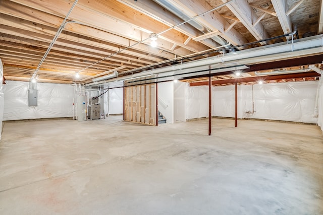 basement with electric panel and heating unit