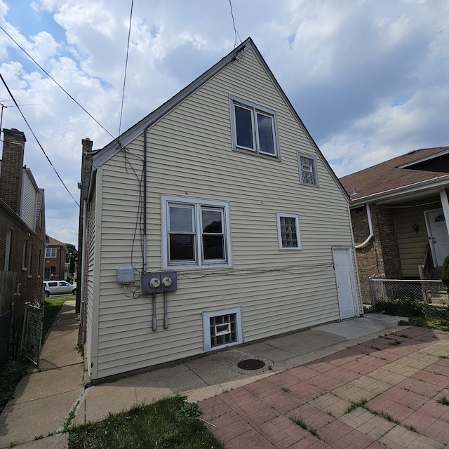 back of house with a patio