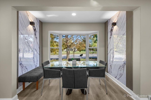 dining room with light wood-type flooring