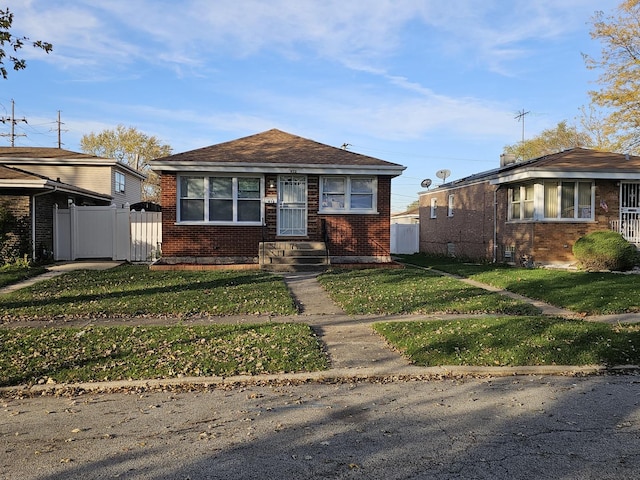 view of front of house with a front lawn