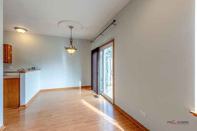 bathroom featuring hardwood / wood-style floors, vanity, and toilet