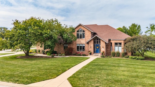 view of front of home with a front yard